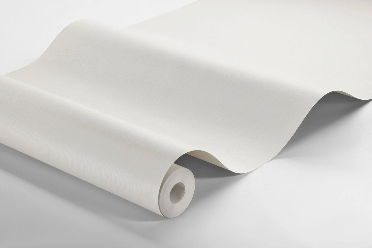 Colored in fresh white and delicate beige hues, our Adam wallpaper adds a touch of elegance and warmth to your interior.