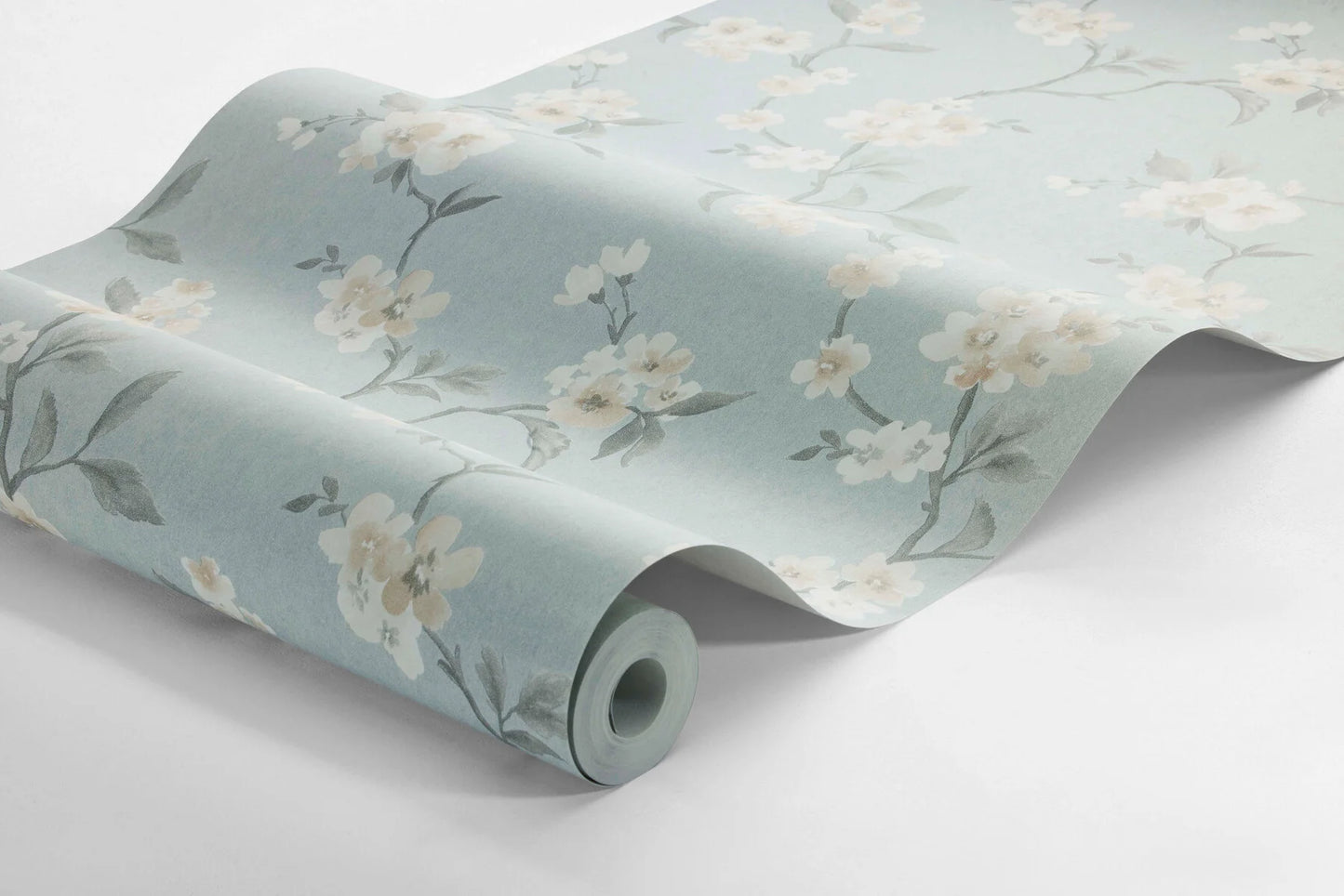 Colored in a dreamy palette on a pale blue background, our Marie wallpaper enchants your space with its watercolor-painted cherry branches.
