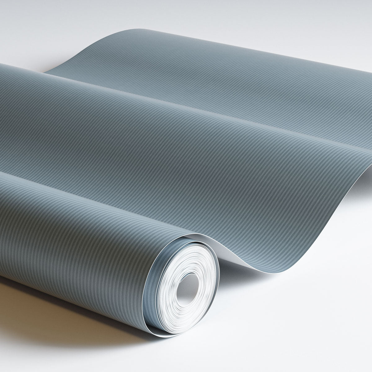 Arvid is a thin and soft striped wallpaper.