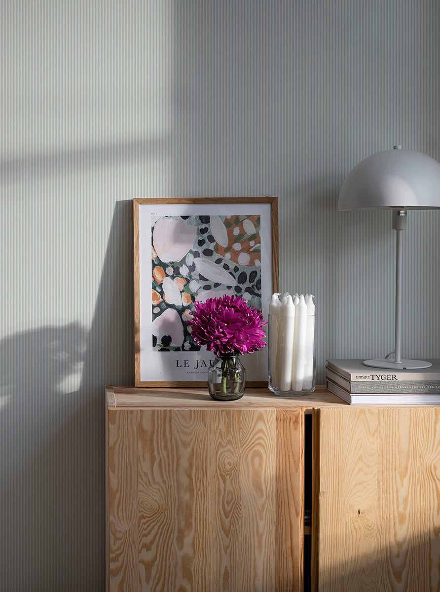 Arvid is a thin and soft striped wallpaper.