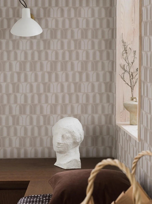 Colored in soft pastel beige tones, our Venice wallpaper draws inspiration from 1970s Italy and the elegant windows of old Venetian buildings.