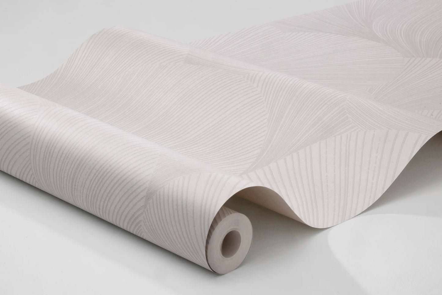 Colored in a pretty palette of white and neutral tones, our Mirage wallpaper features delicate lines and subtle shading to create a softly minimalist and exquisitely modern design.