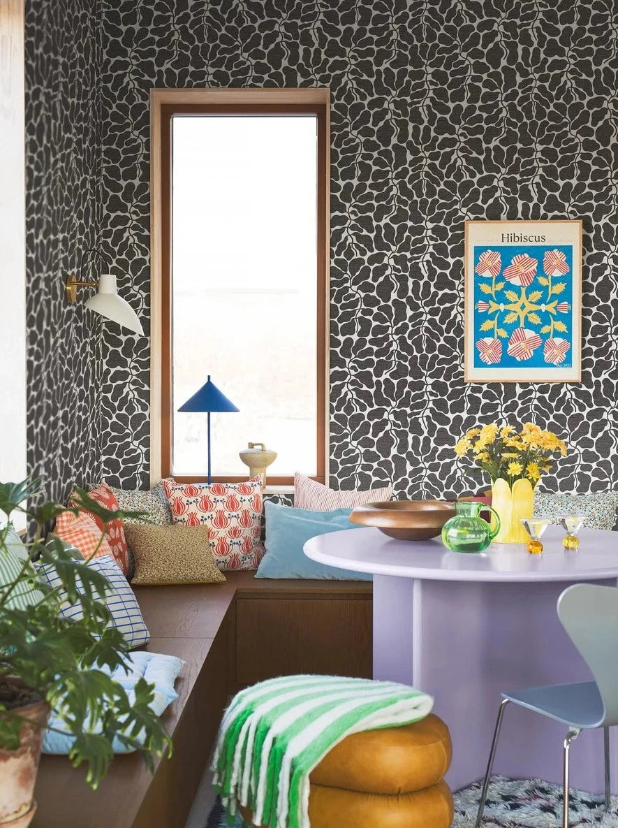 Escape to a tranquil oasis with the foliage pattern of My Secret Garden wallpaper in muted black tones on a crisp white background.
