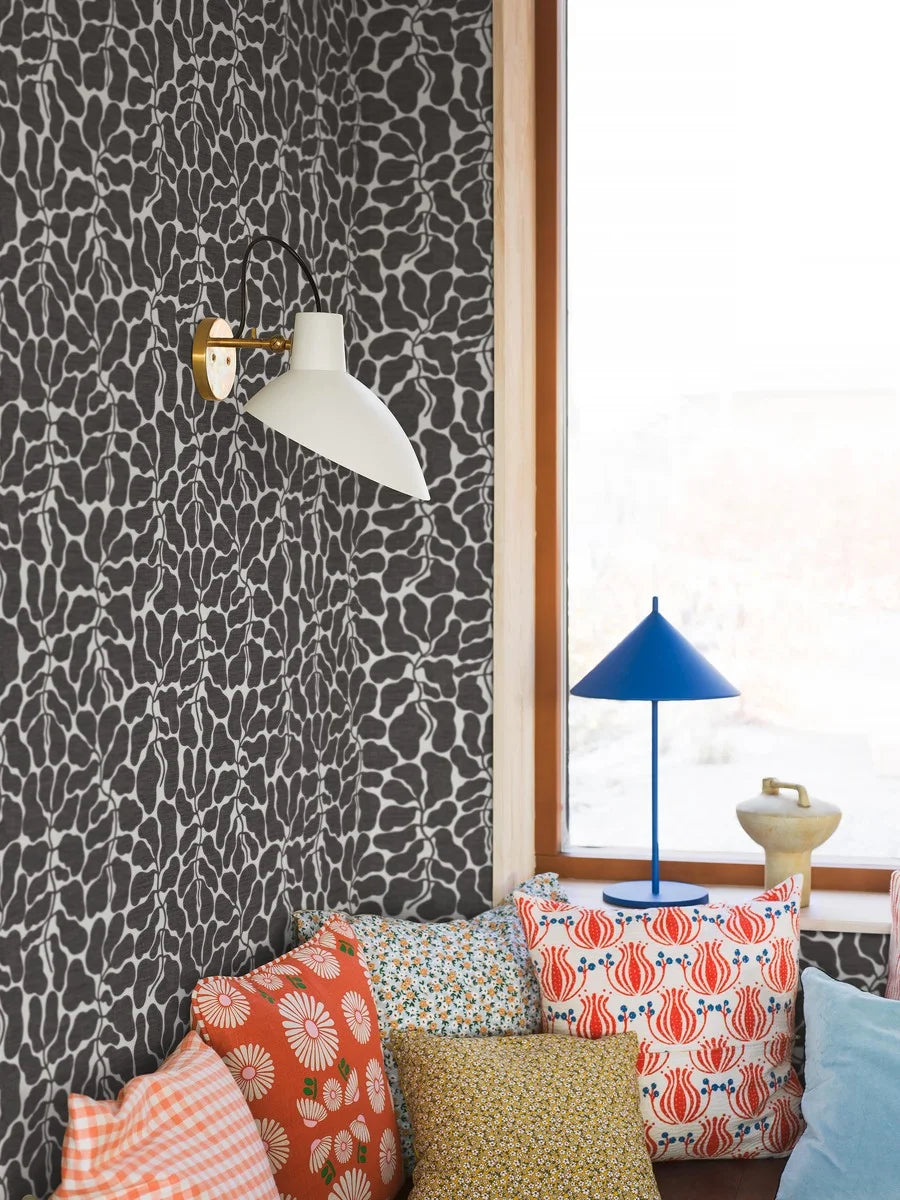 Escape to a tranquil oasis with the foliage pattern of My Secret Garden wallpaper in muted black tones on a crisp white background.