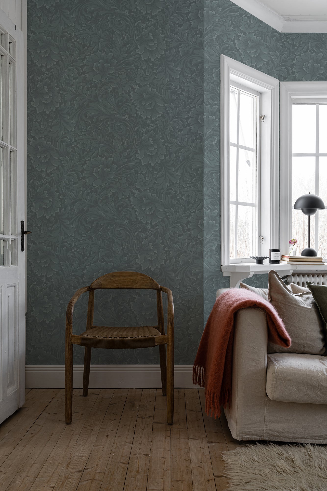 In a blend of fantasy and tradition on wallpaper, leafy tendrils and ornaments intertwine.