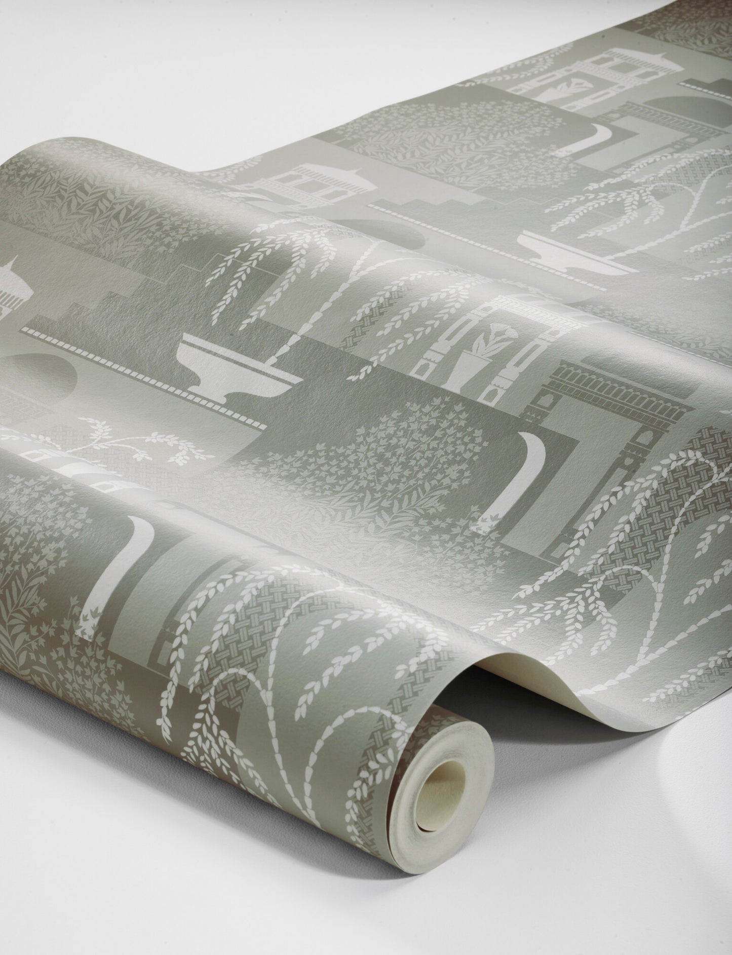 Colored in a muted cool green with a perfectly contrasting light gray, our Mimi wallpaper is indulgent and calming in character.