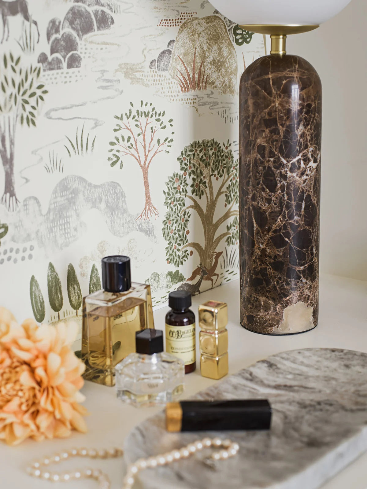 Indulge in the naturalistic allure of our Diana wallpaper in muted tones of olive green, terracotta and warm gray and beige tones.