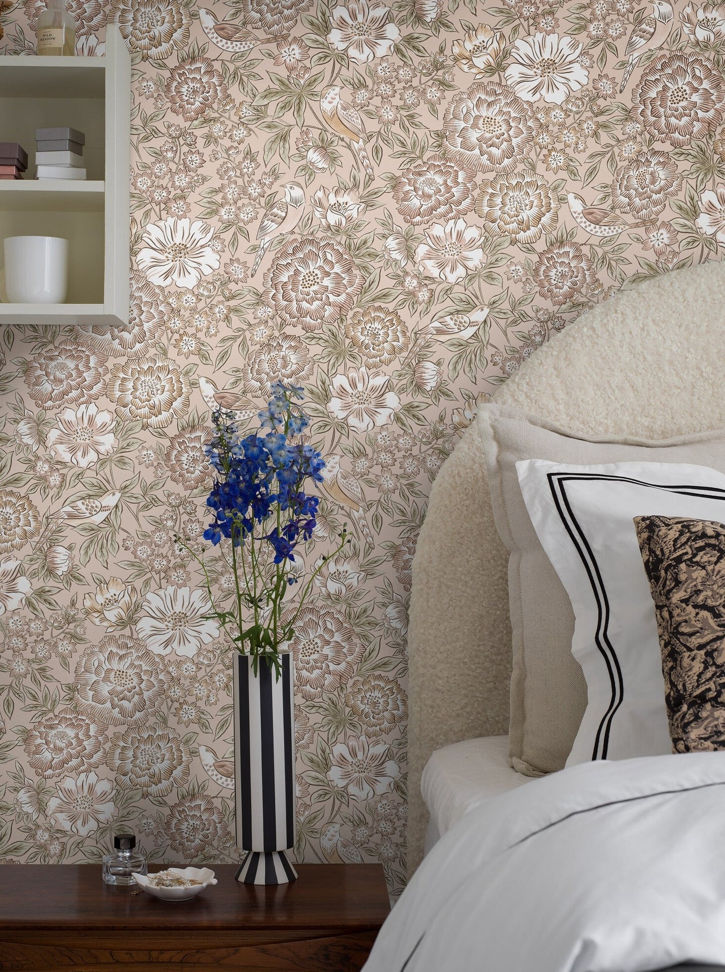 Infuse your space with the delicate beauty of flowers in apricot and pink tones, decorated with subtle rusty orange detailing.