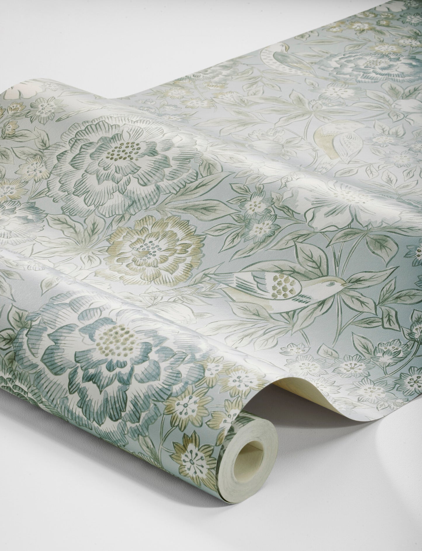Experience the cool and refreshing expression of Dagmar wallpaper colored in shades of cool blue with hints of beige and muted teal green.