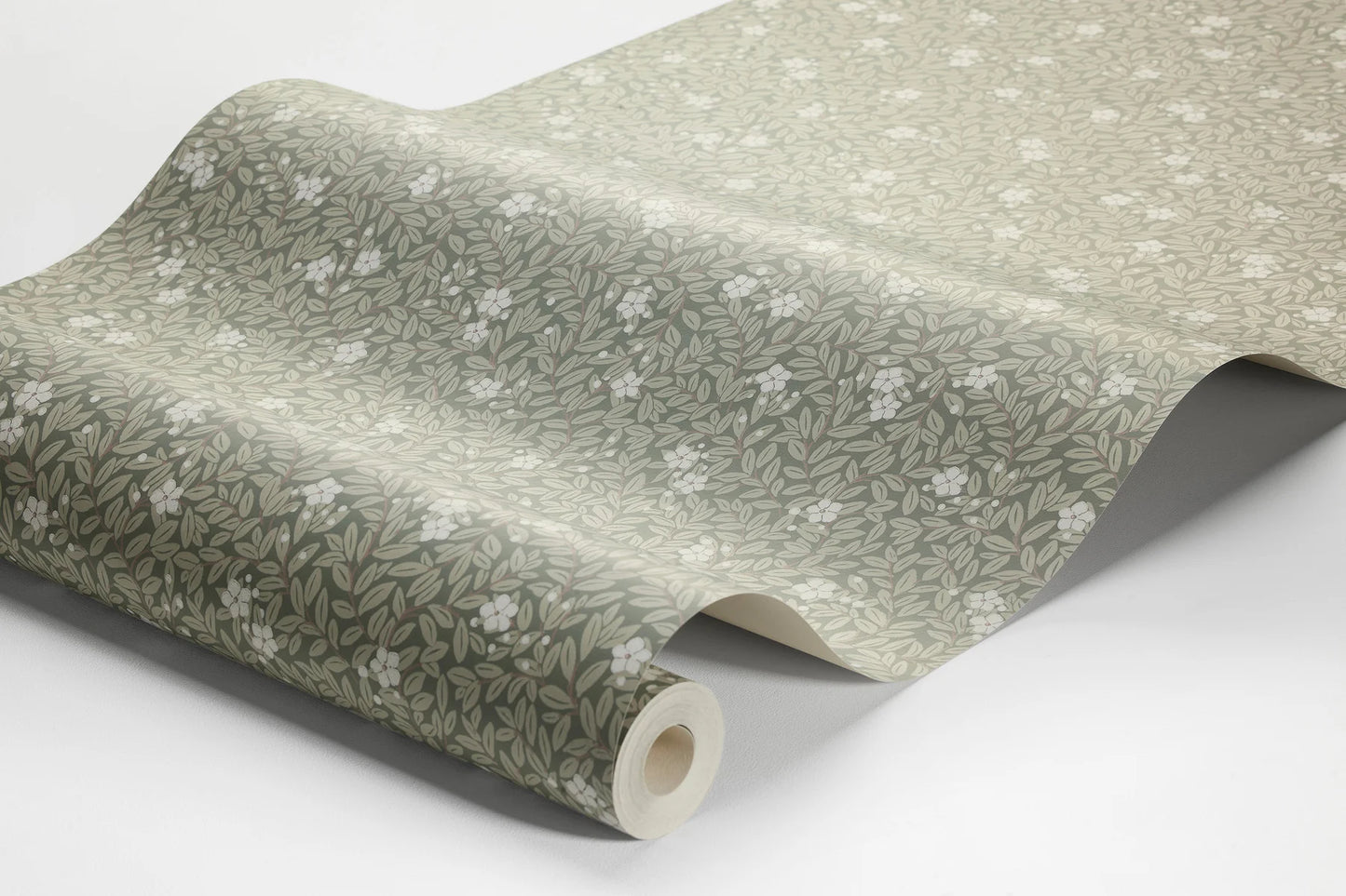 Dive into the depths of nature with our Myrten wallpaper with a tone-on-tone dark bottle green palette in a surface print.