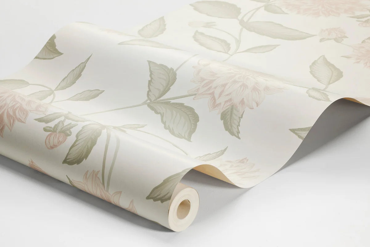 Step into the magnificent blooms of our Dahliadröm wallpaper in a sublime palette of apricot pink, and warm green on a cream background.