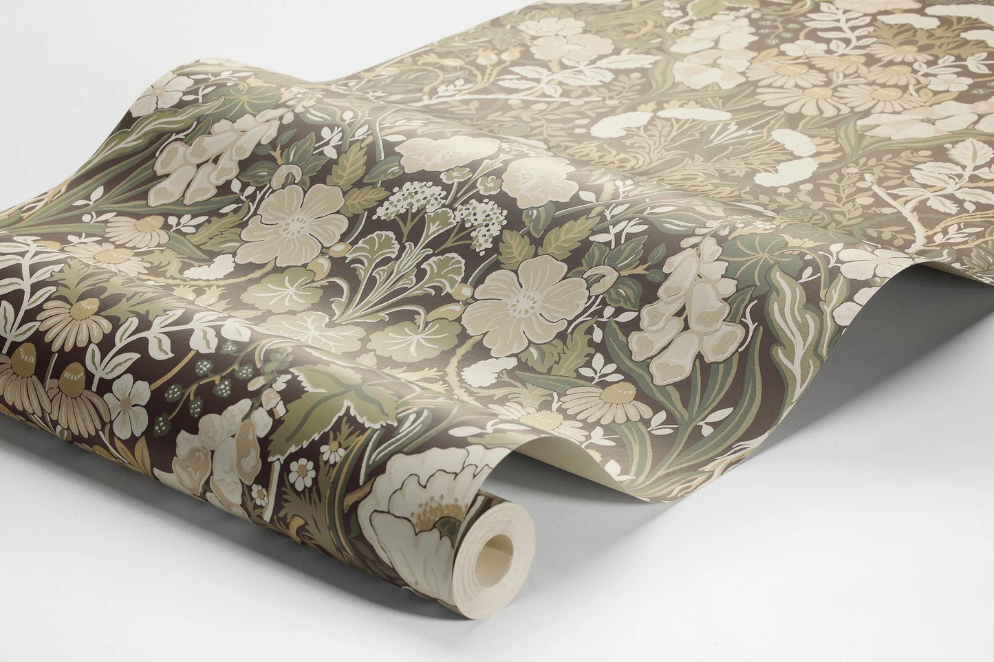 Colored in a neutral and contemporary palette of green, white, and beige set against a bold near black base, our Örtagård wallpaper is lush and vibrant.