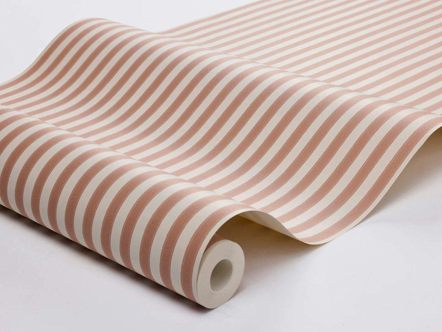 Mölle Stripe is a striped wallpaper inspired by the classic Swedish seaside town of Mölle in Skåne – known for its free-spirited bathing culture at the turn of the 20th century.