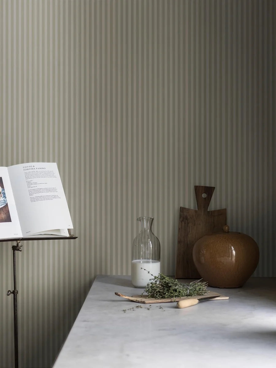 Mölle Stripe is a striped wallpaper inspired by the classic Swedish seaside town of Mölle in Skåne – known for its free-spirited bathing culture at the turn of the 20th century.