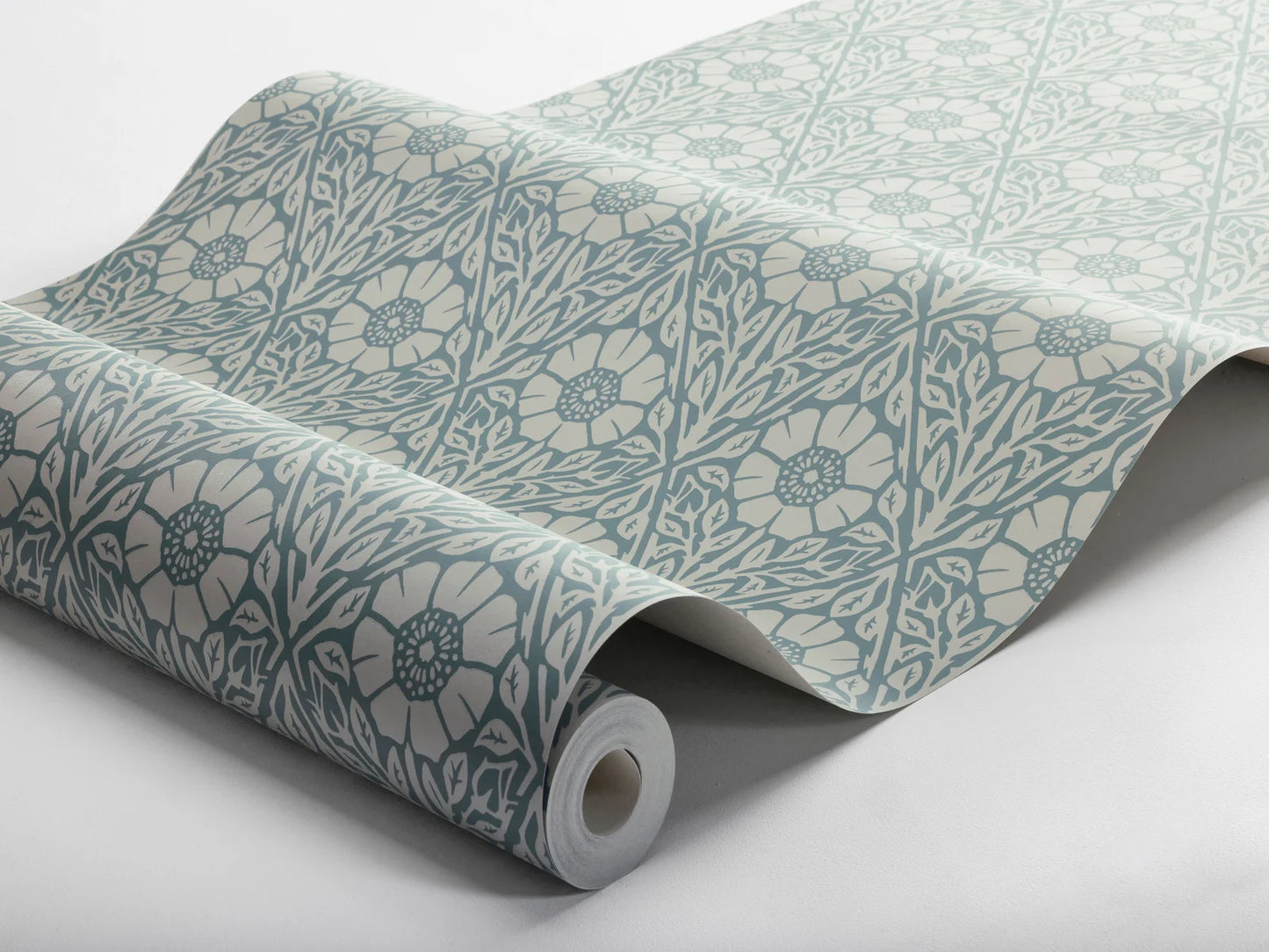 In a soft petrol blue palette, our Nyponros wallpaper brings a calm and refreshing vibe to your walls.