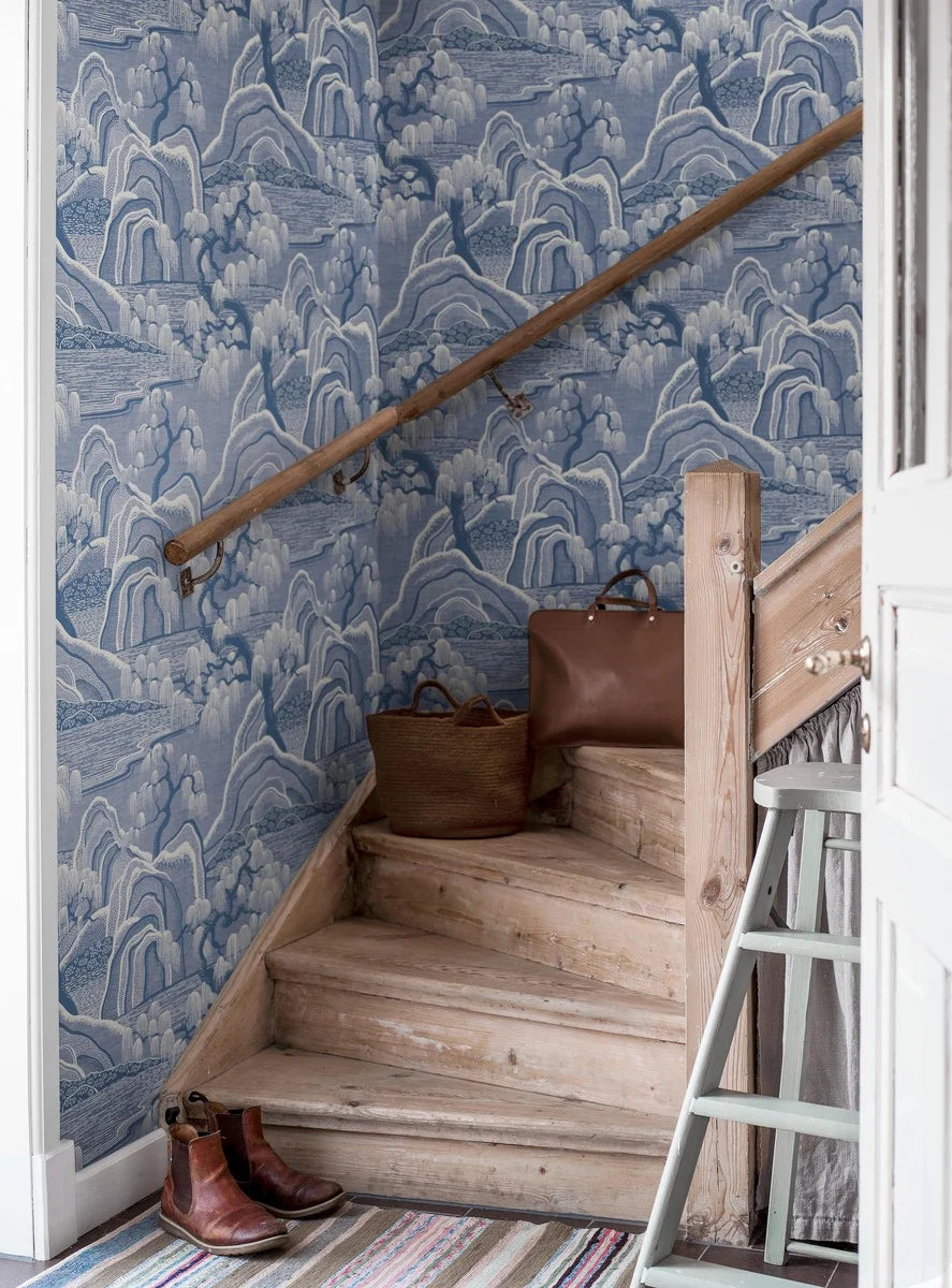 Inspired by the timeless beauty of classic porcelain, our Indigo Garden wallpaper is rendered in the rich, deep hues of porcelain blue, accented with white details.