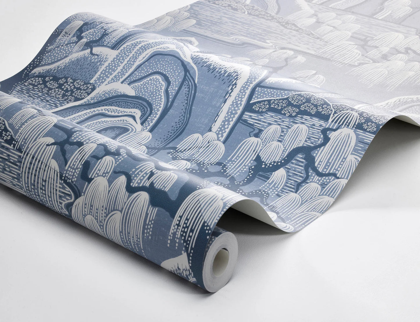 Inspired by the timeless beauty of classic porcelain, our Indigo Garden wallpaper is rendered in the rich, deep hues of porcelain blue, accented with white details.