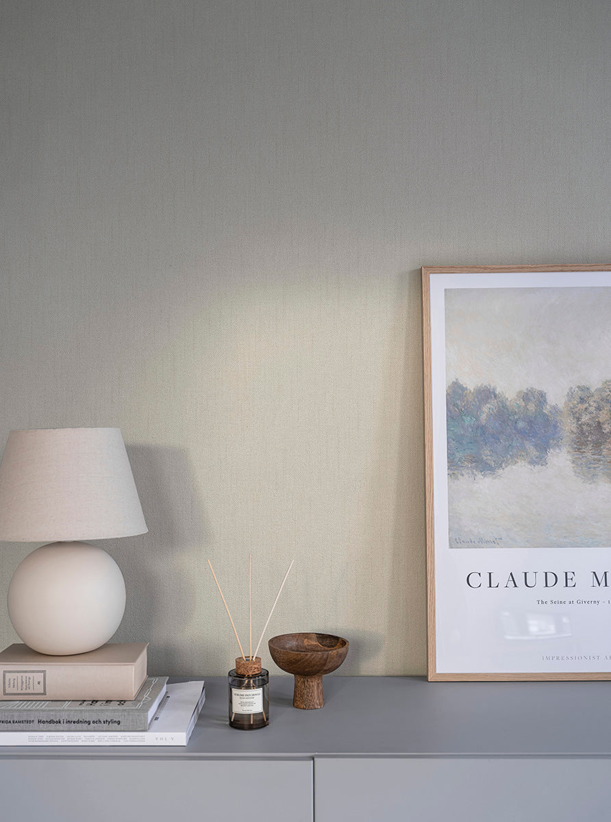 Cotton is a plain wallpaper with a woven appearance like a cotton fabric.