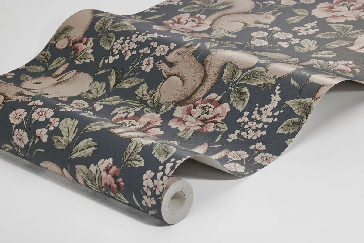 Colored in a delightful dark blue background with pink and green detailing, our Magic Forest children’s wallpaper is enchanting and exciting.