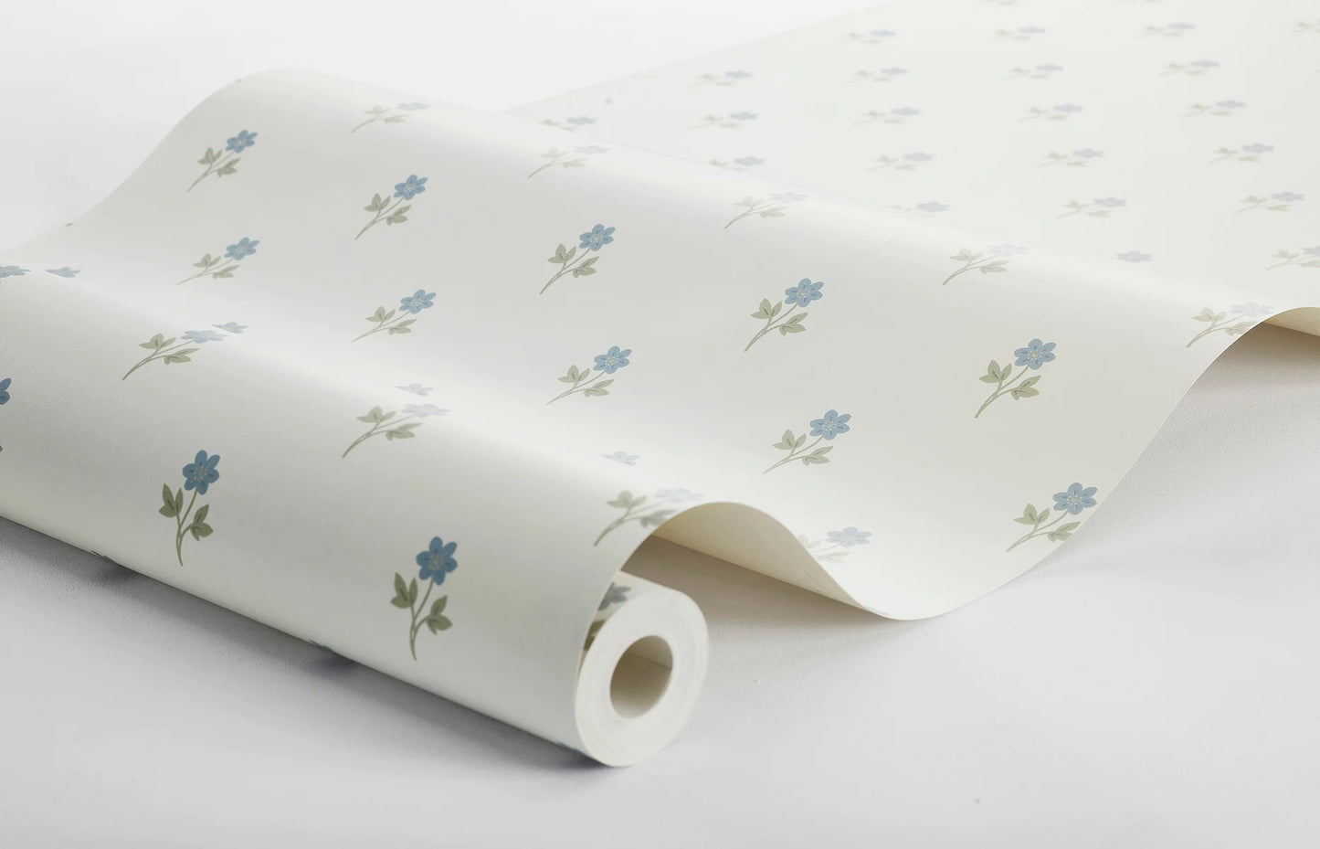 This graceful Anemone wallpaper has blue anemone flowers with green leaves on a white background.