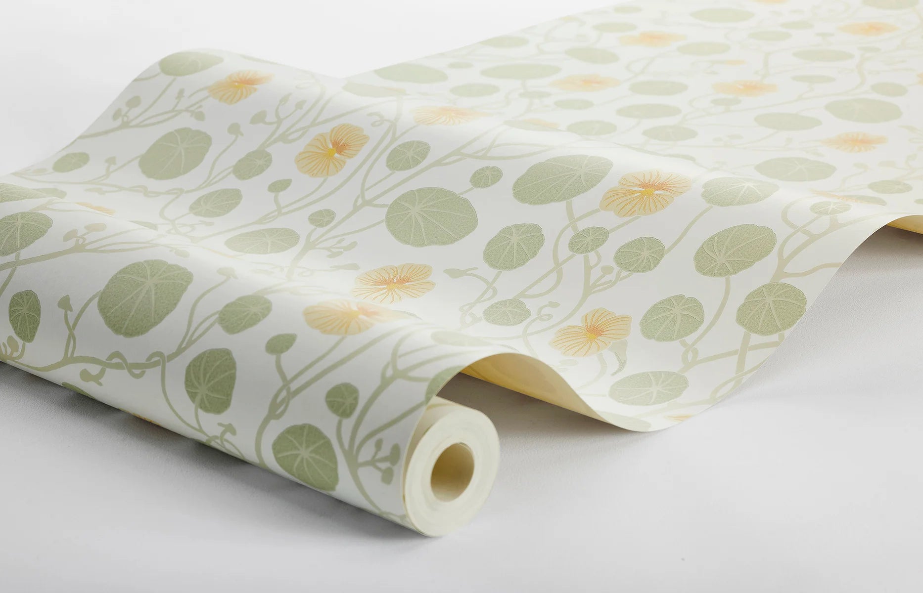 Krasse wallpaper is filled with cheerful Rock Cress flowers in bright yellow tones, with fresh green leaves and winding stems on a white background.