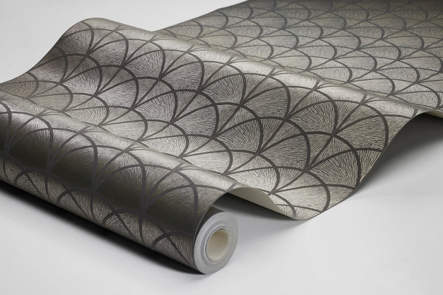 Colored in a cool golden tone on a smoky grey backdrop, our Deco Arch features geometric arches paired with diffused ray detailing.