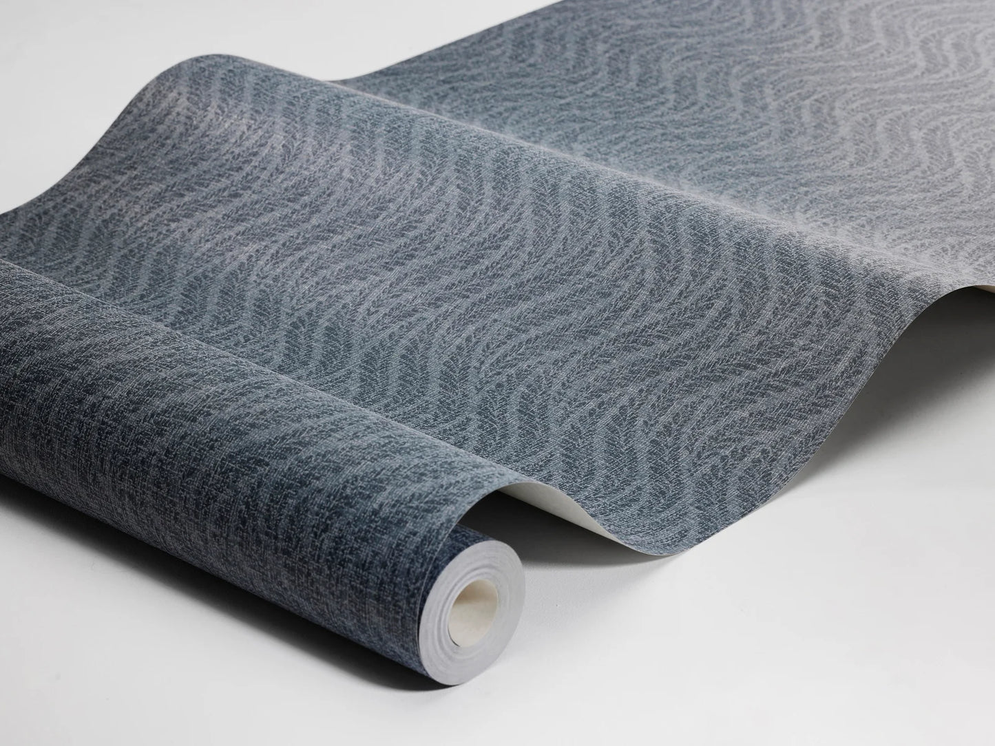 Colored in rich, dark indigo blue, our Little Fern wallpaper makes a bold yet refined statement.