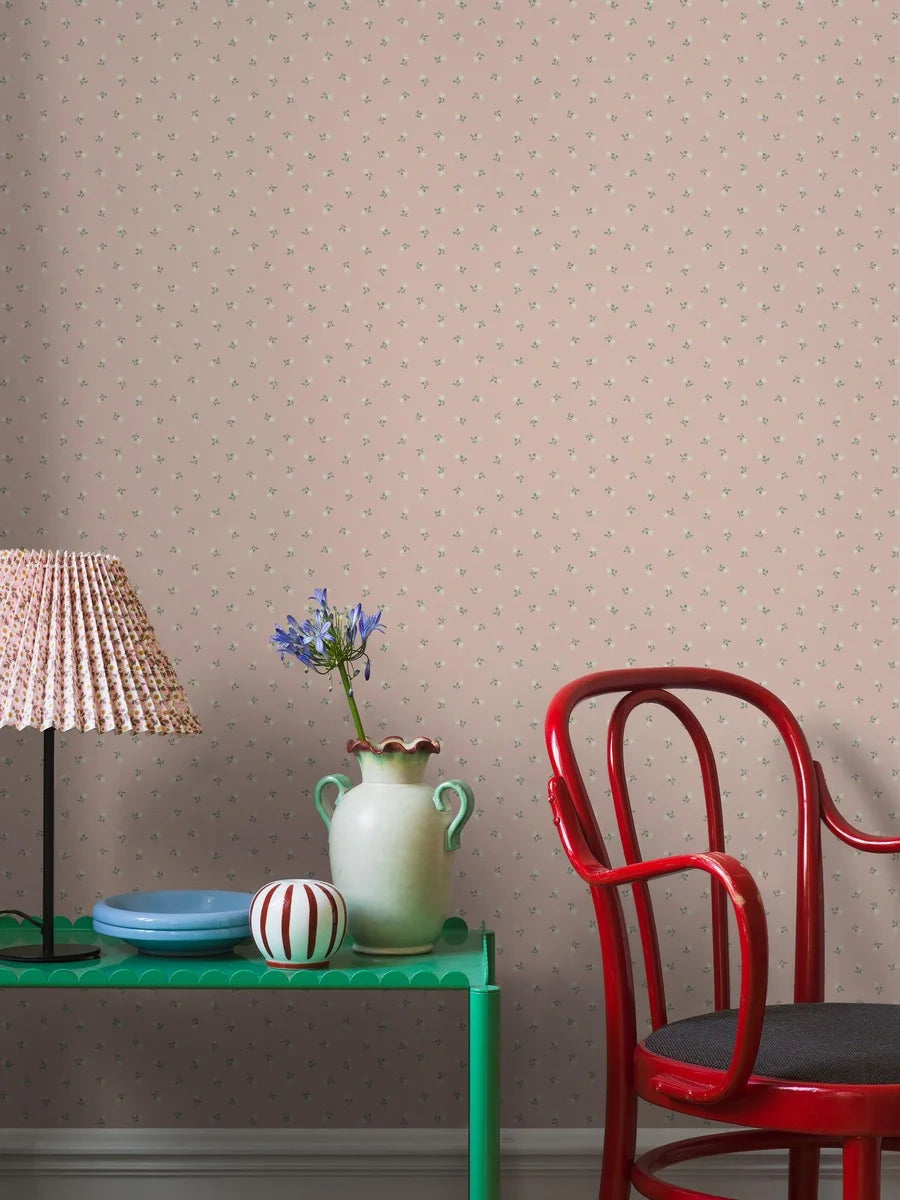 Colored in a pink palette with green and white detailing, our Petite Chérie wallpaper blends timeless expression with playful charm.