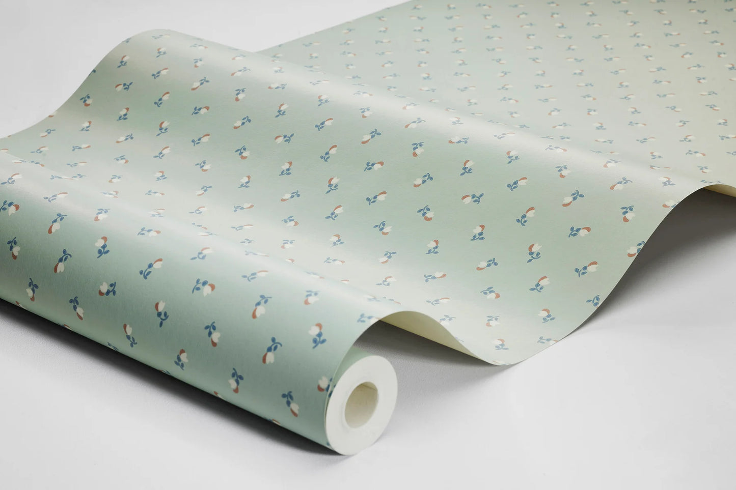 Colored in a fresh green palette with blue, white and red accents, our Petite Chérie wallpaper exudes a vibrant, modern energy.