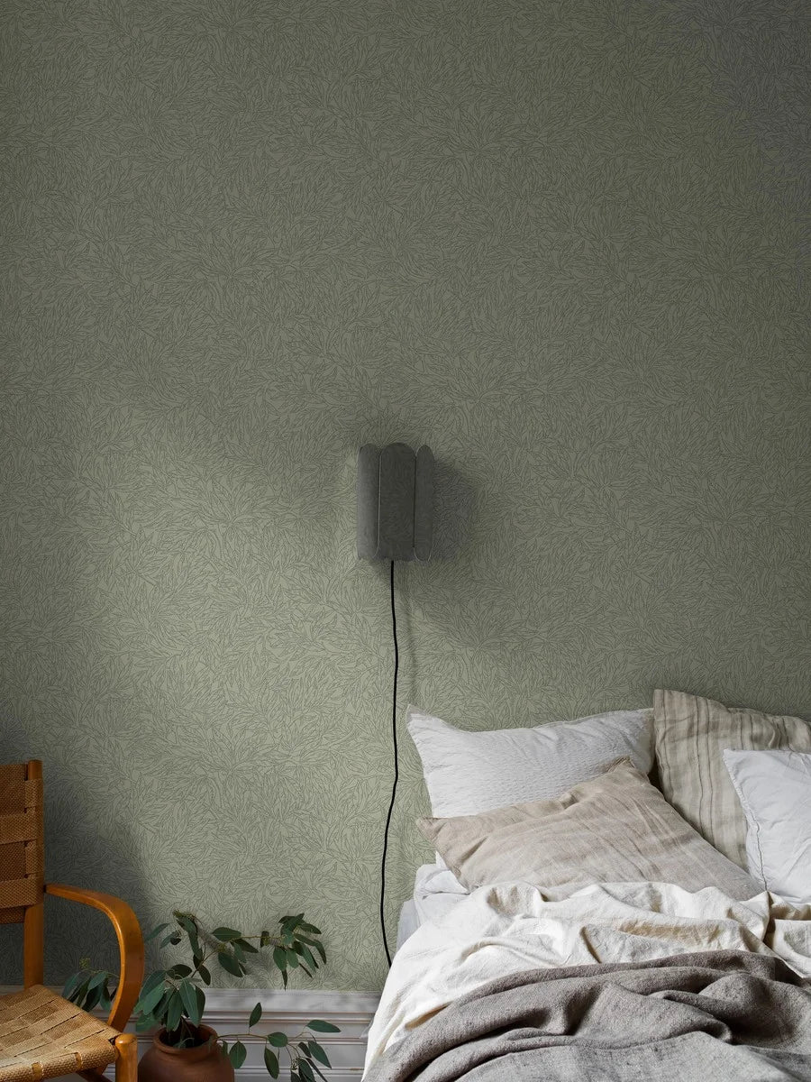 Our Salix Alba wallpaper in mild green tones creates a serene and enveloping atmosphere, inspired by the vibrant density of lush summer foliage.