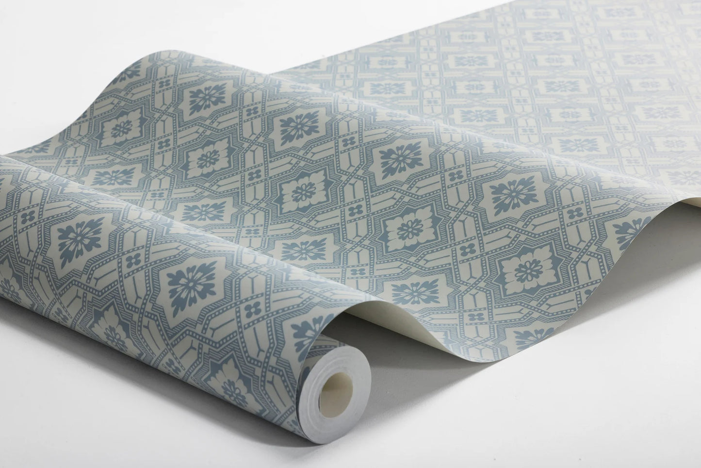 Colored in an exquisite blue that echoes the popular palettes of the early 20th century, our Friedrich wallpaper adds subtle texture and refined interest to any space.