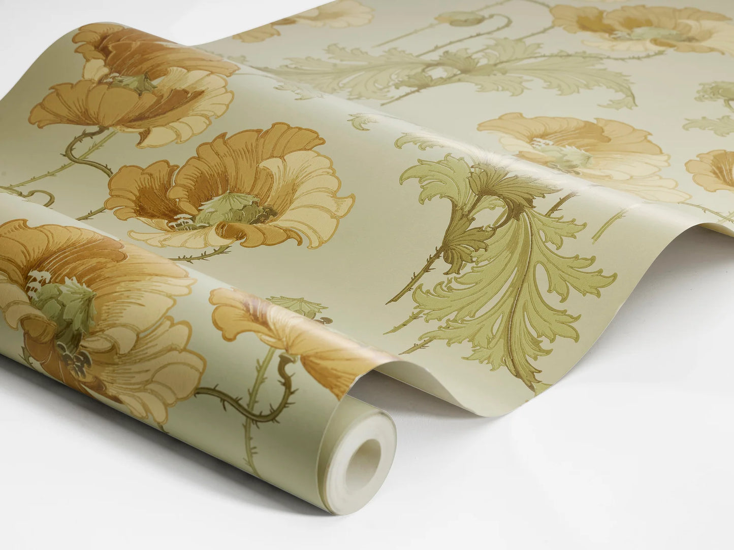 The stately poppies in this Vallmo wallpaper are colored in golden ochre and sandy yellow blooms on a soft green background