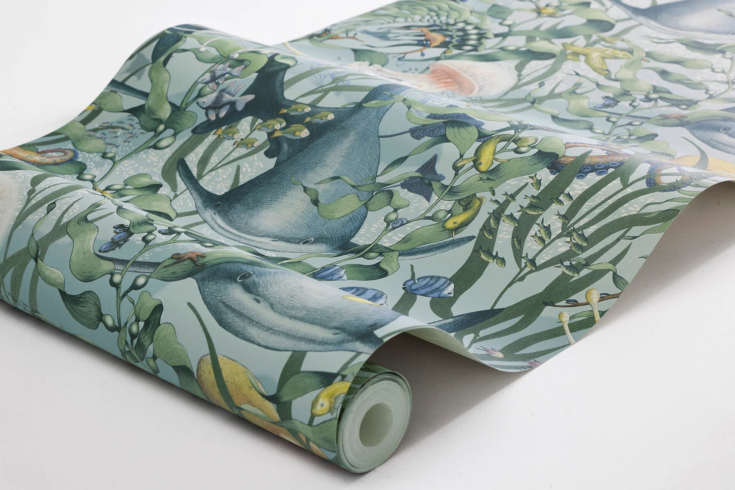 Dive into a vibrant underwater world set against an aqua-green background with our Underwater Magic wallpaper.