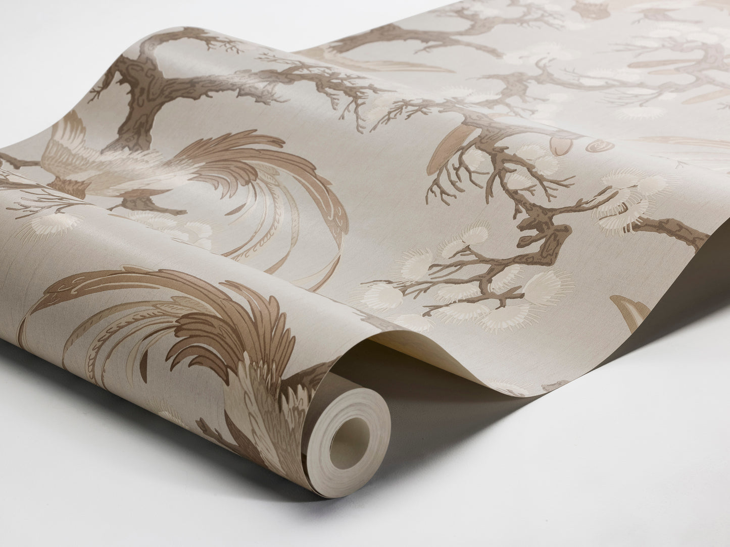 Fenix wallpaper pairs a warm brown-beige background with refined, hand-drawn birds resting among pine tree branches.
