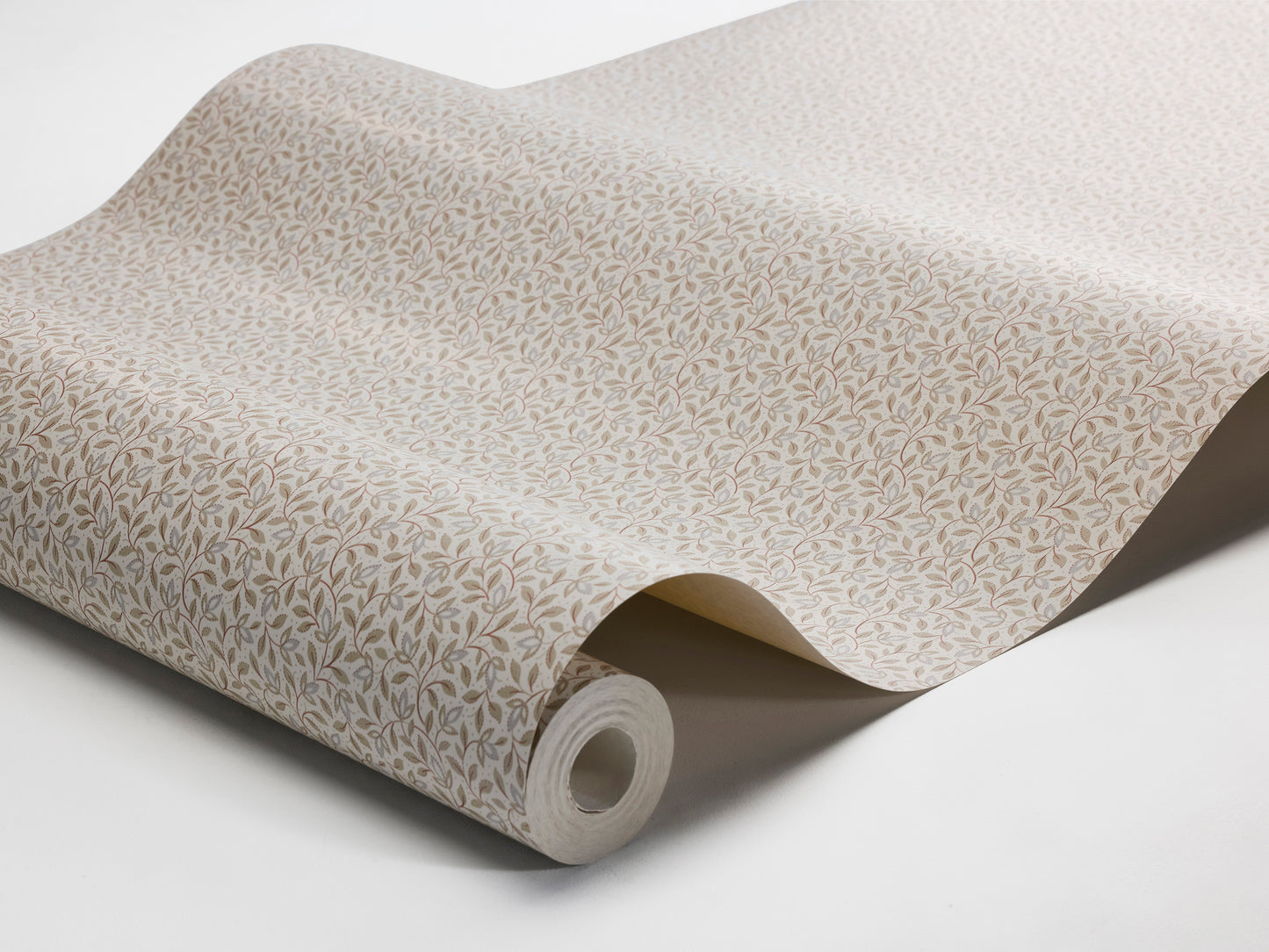 In warm beige tones, our Ida wallpaper reveals a graceful vine pattern of soft leaves and slender stems.
