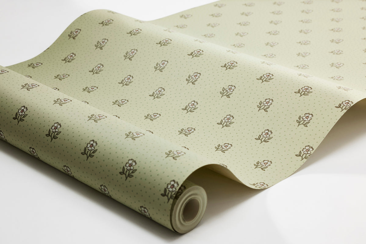 Déesiré is a Classic, small-floral wallpaper with an airy, hand-painted pattern of charming little flowers on a dotted background.