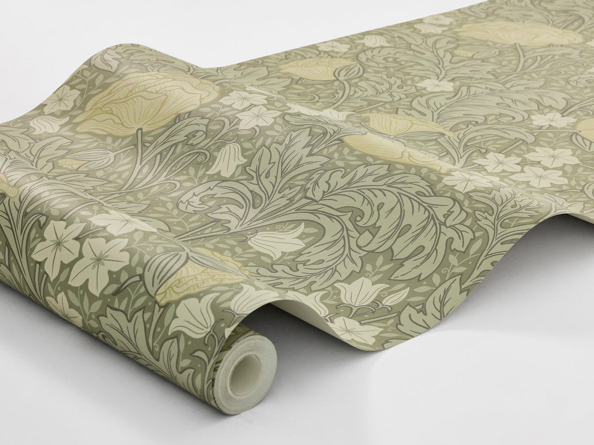 On the green, large-floral wallpaper Blomdansen, the blooms of the peony poppy are joined by beautiful, acanthus-like leaves and delicate bell-shaped flowers on slender stems.