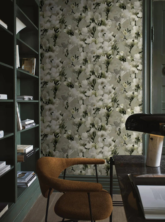 White Lily is a light, floral wallpaper consisting of sculptural magnolia branches in a photorealistic pattern.