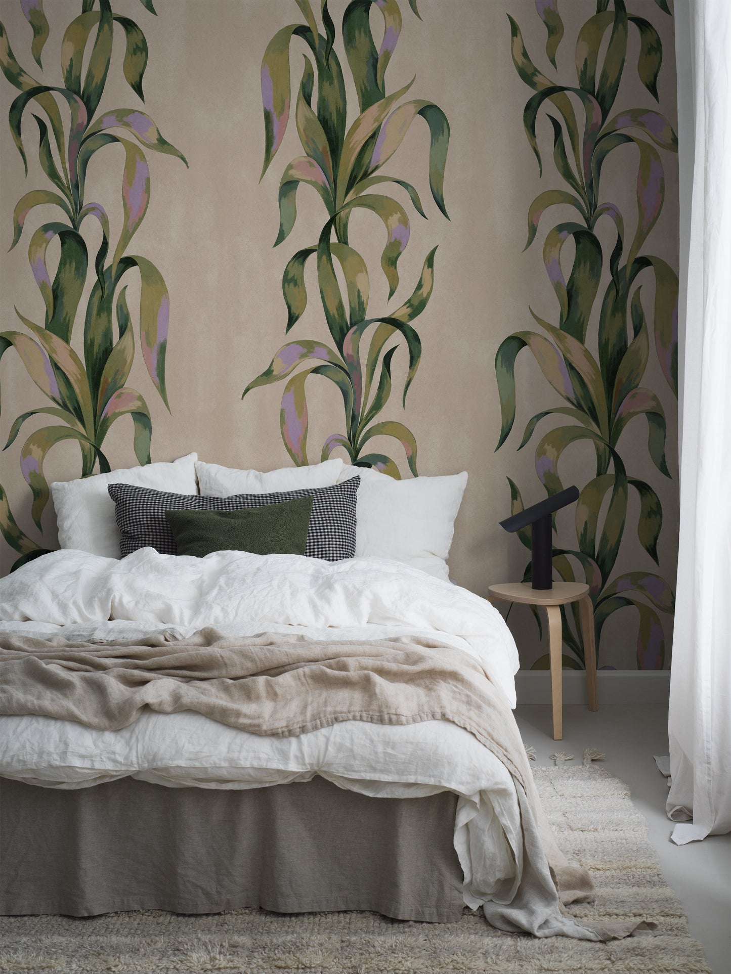 Agave is a modern wallpaper featuring a stylized pattern of bold agave leaves reaching toward the ceiling, creating a wonderful sense of space in the room.