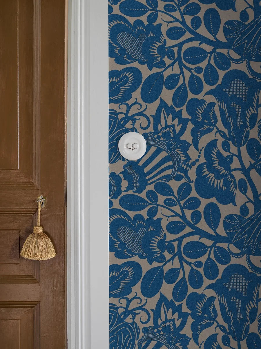 This wonderful Semiramis wallpaper, designed by ornamental genius Dagobert Peche, sees modernist and geometric elements meet organic floral forms.