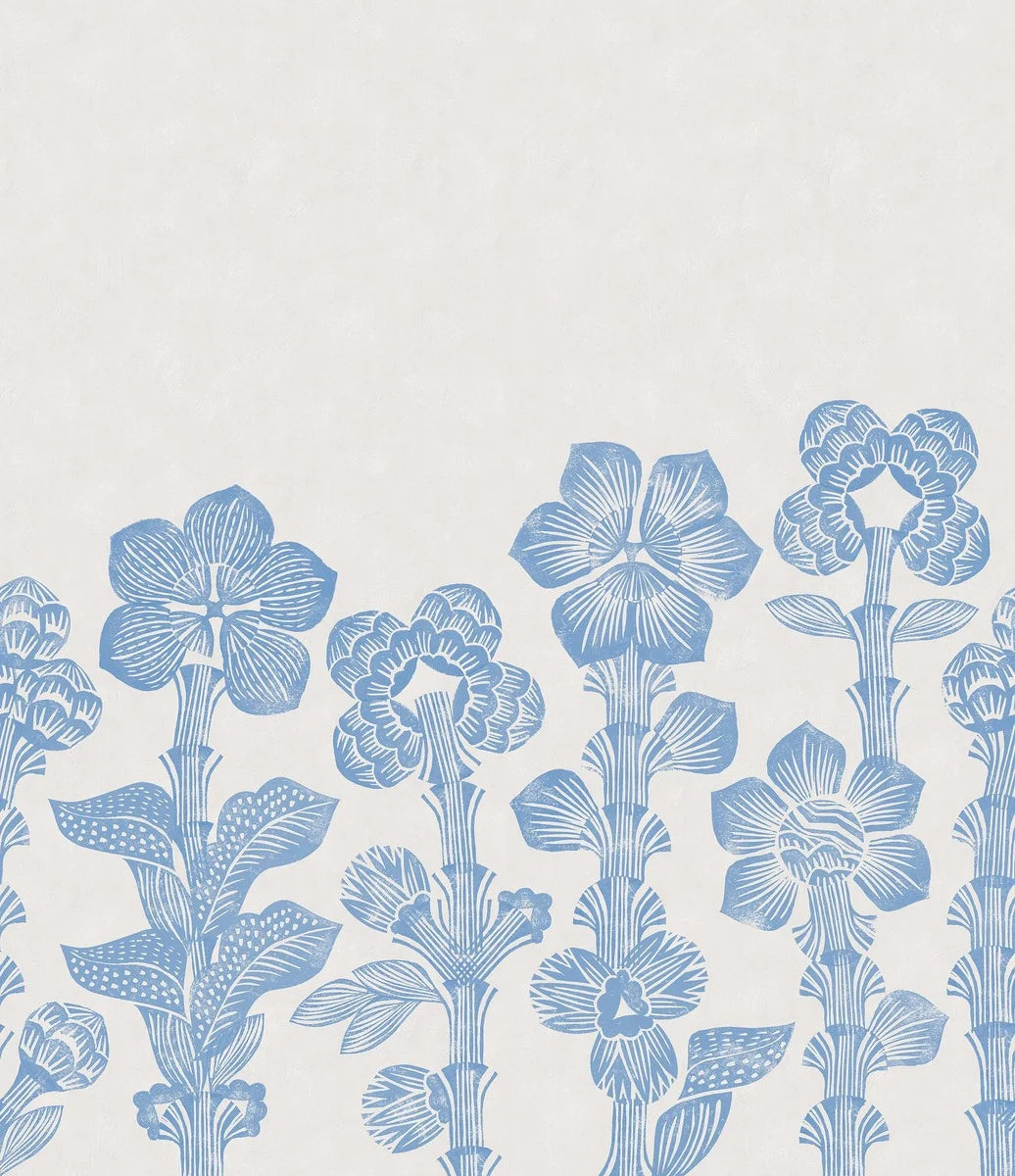 Across the mural wallpaper Storflax, majestic fantasy flowers stretch high towards the ceiling in a playful yet bold pattern, designed by Hanna Werning.