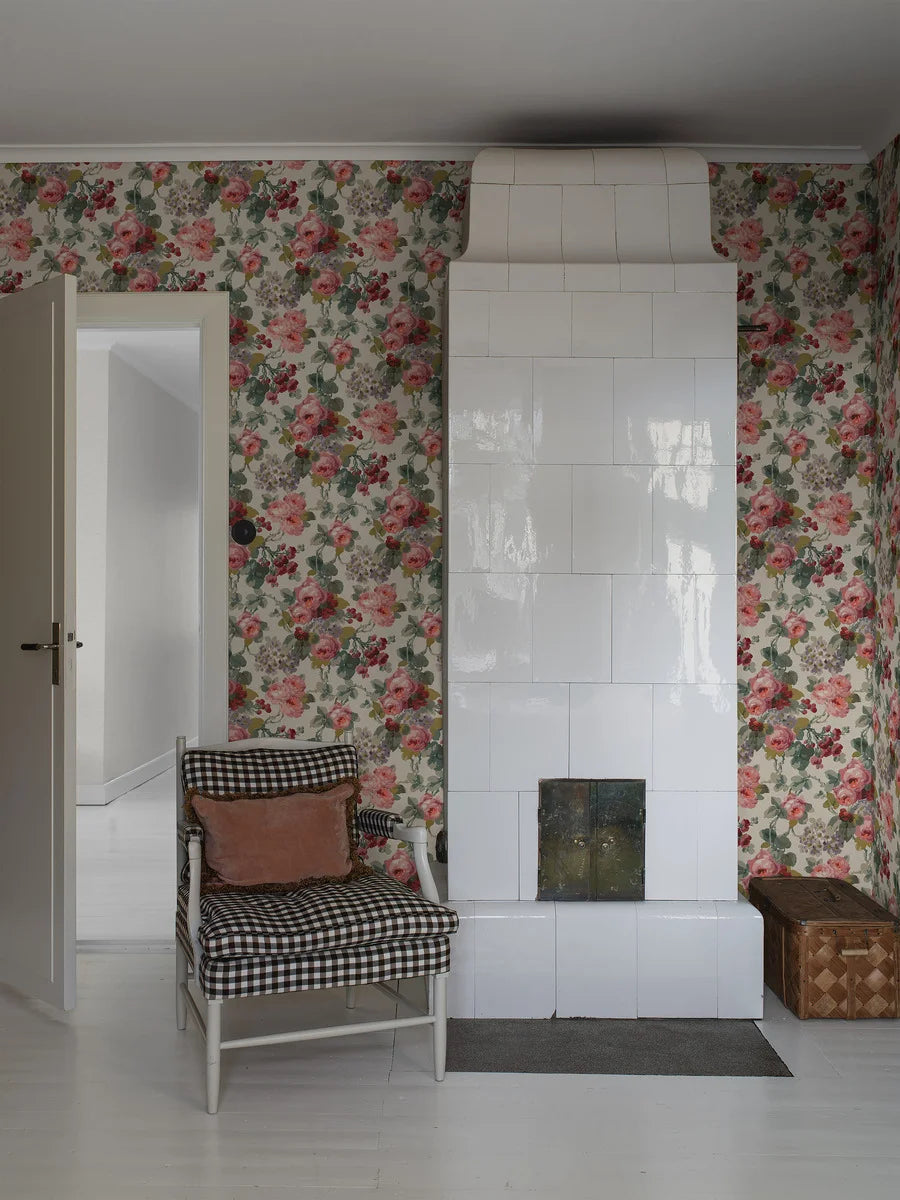 Colored in a palette of red, pink and green on a warm neutral background, our Madame wallpaper evokes the scent and warmth of a summer garden.