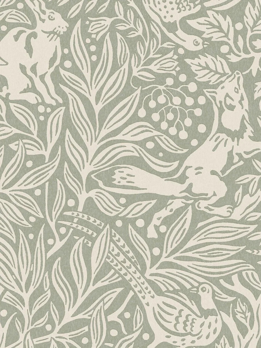 Under the Elder Tree Grand is a boldly patterned wallpaper, covered in lush foliage filled with playful animals.