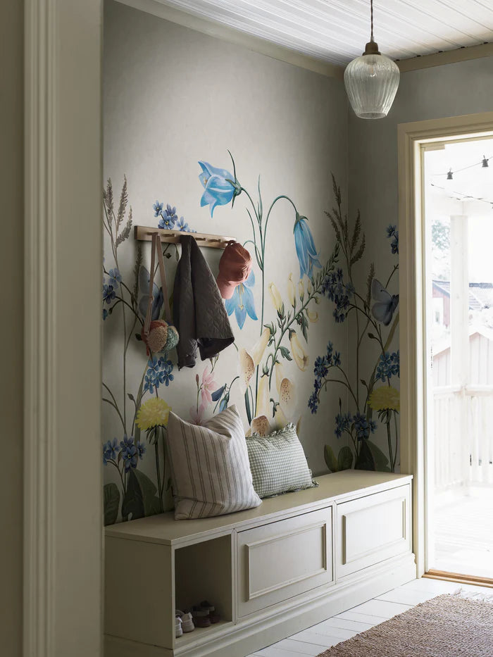 Step into an enchanting meadow of bluebells with the Bluebell Magic mural wallpaper.