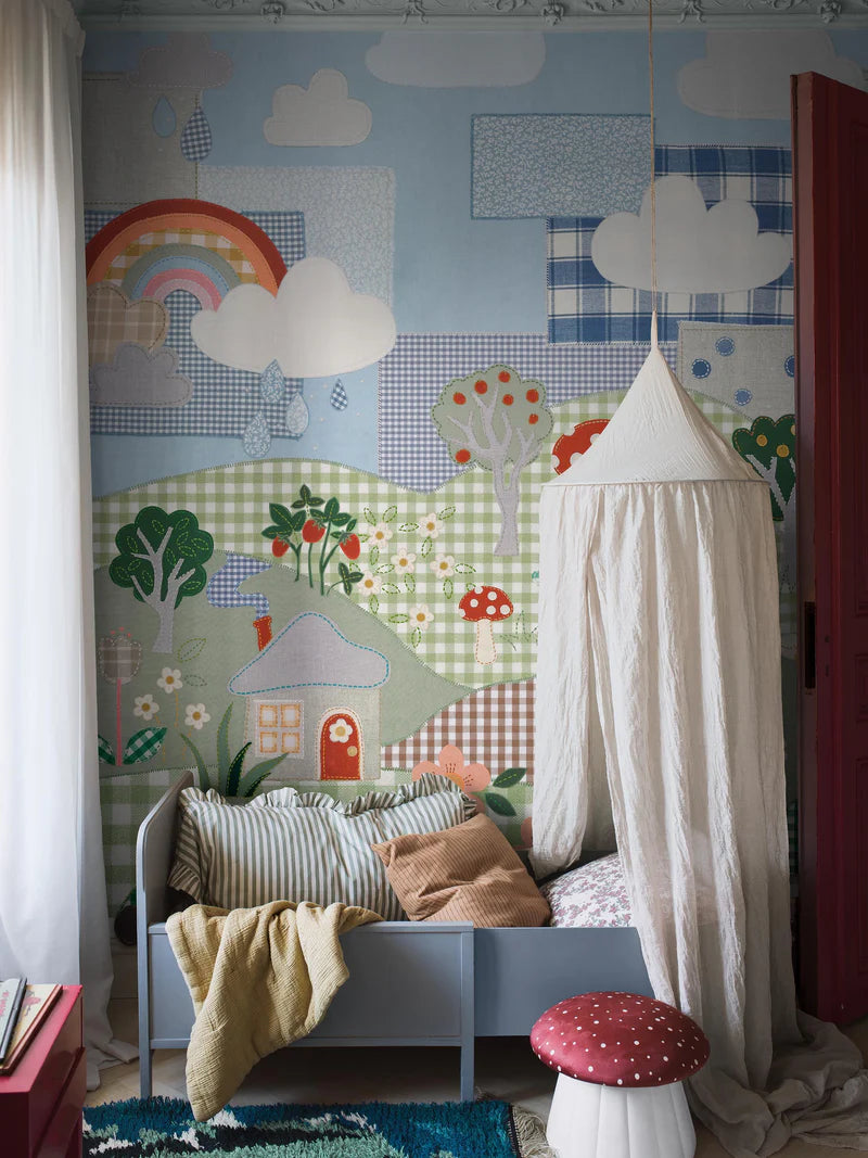 Full of charming little details waiting to be discovered, Cottage Patchwork is a children's mural wallpaper brought to life through a playful handmade collage of cut fabric pieces.