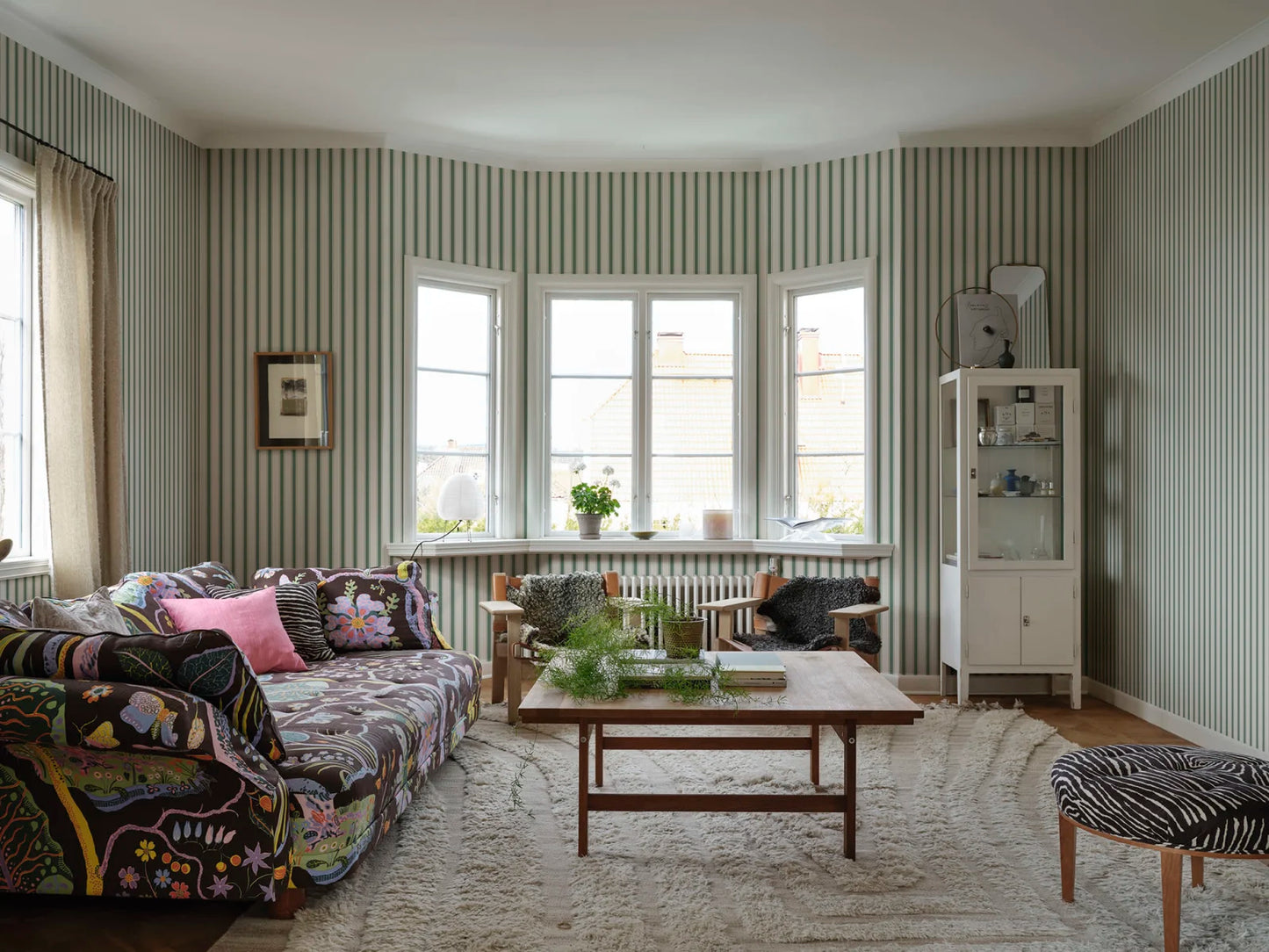 Our classic narrow striped wallpaper with small elegant gold dots is inspired by the beautiful silk draperies and furniture fabrics of the 18th century.