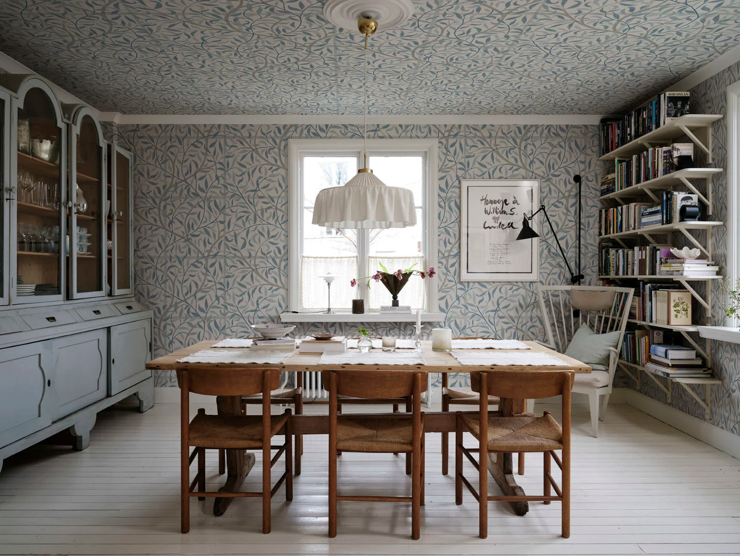 It's a lovely wallpaper with trellis that embraces the room and makes it lush year-round. Emmie, Misty Blue, comes in beautiful shades of misty blue.