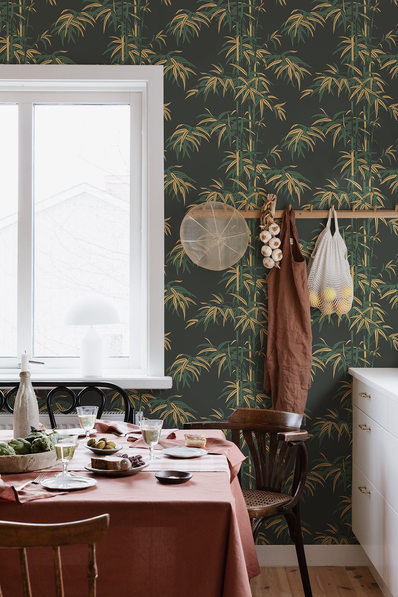 The wallpaper Leon, Charcoal features a dark charcoal background with deep green and yellow highlights.