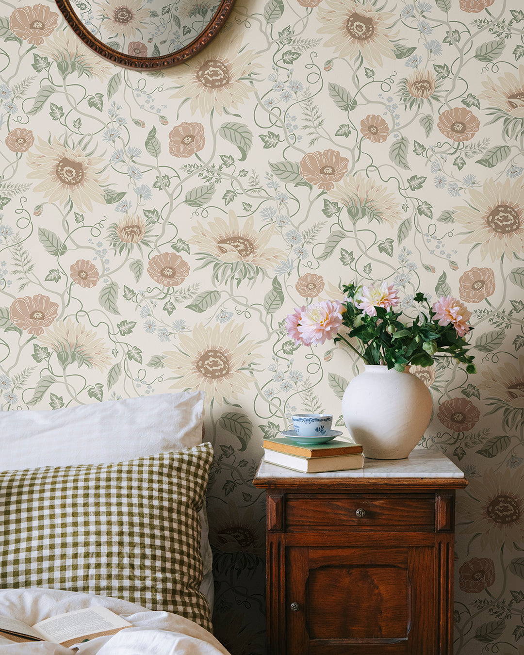 Solveig, Colorful, this wallpaper has a soft light base adorned by muted red, beige, and blue flowers with green foliage.