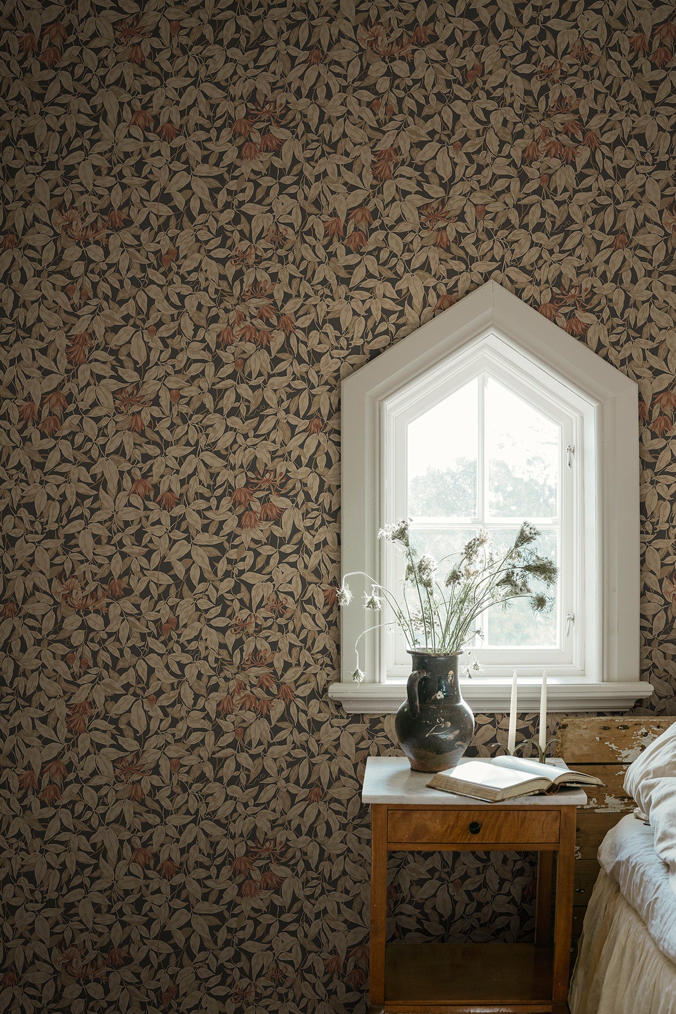 Our popular Linnea pattern, featuring softly verdant clematis and honeysuckle, this wallpaper brings character and life to your home.